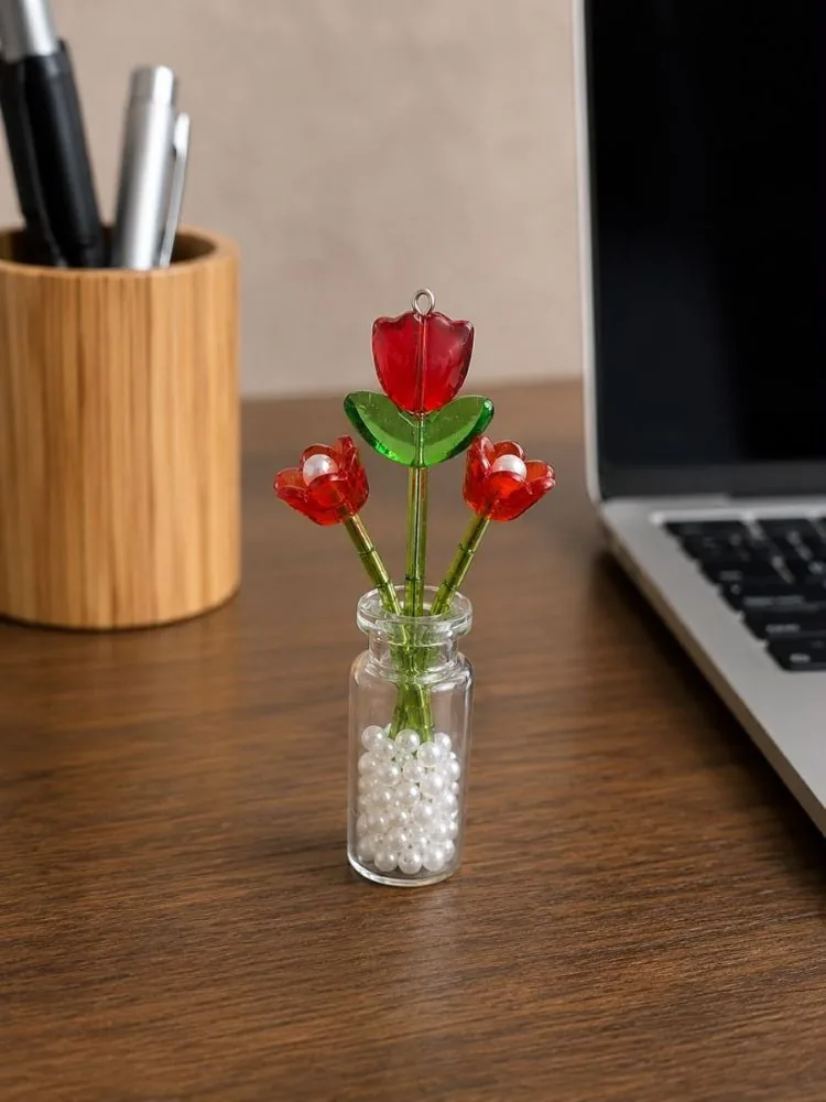Scarlet Rose Bottle — handmade red roses in a pearl-filled glass bottle by MeShanvi Studio